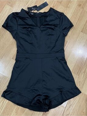 Bebe Black Satin Romper Playsuit V-Neck Ruffle Hem NWT Size 8 Going Out